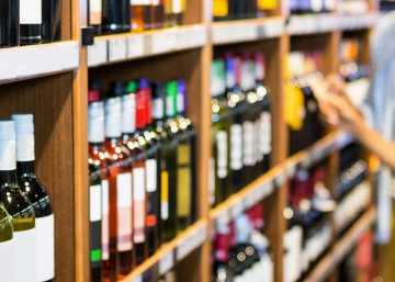 Wine and beverage packaging labels and shelf talker signage in retail setting