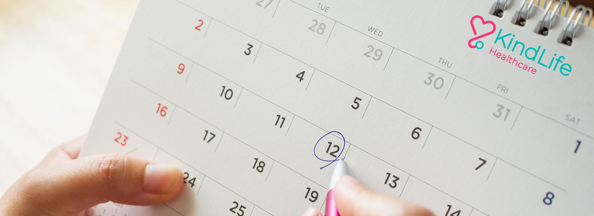 Woman circling date on marketing event calendar as opportunity for promotional marketing products