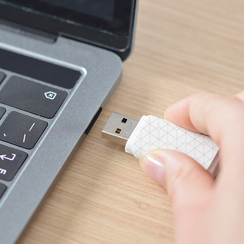 A USB drive as an example of promotional marketing technology items for corporate events