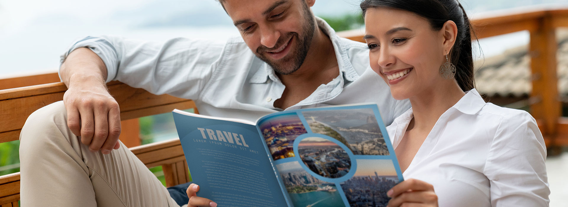 Couple reading printed brochure illustrating spot varnish and other enhanced print techniques